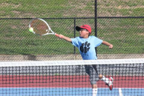 Jack Getty extends to return a ball during a singles match at Rabun County High School’s tennis courts in Tiger on Tuesday. (Photo by Glendon Poe/The Clayton Tribune)