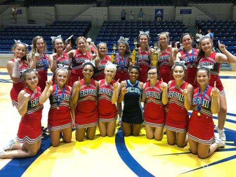 Rabun County cheerleaders are, in back, from left, Rainny Patterson, Kasten Weems, Savanna Sullivan, Cassidy Richardson, Brianna Henslee, Miya Stewart, Faith Cofield, Carley Smith, Willow Fisher, Laurel Justus; in front, from left, are Ayla Jarrard, Jaycee Weber, Keianna Owens, Haley Hunt, Jailah Zanders (Universal Cheerleaders Association), Elizabeth Scruggs, Josie Darnell and Maci Varnadoe. (Submitted Photo)