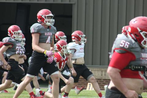 Rabun County wide receiver Braxton Hicks smiles during the team’s warm-up session at a spring practice in May. (Glendon Poe/The Clayton Tribune)