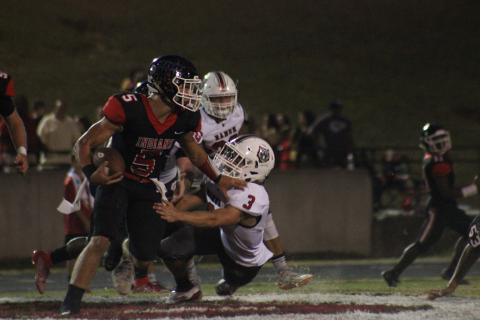 Rabun County linebacker AJ Wheeler (3) attempts to tackle Stephens County running back Hudson Spurlock (5) during the first half in Toccoa last Friday night. (Glendon Poe/The Clayton Tribune)