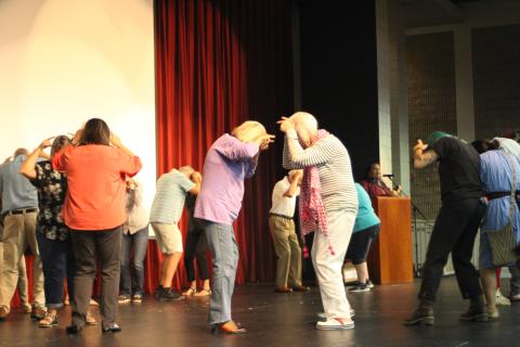 Megan Broome/The Clayton Tribune. Cherokee Friends from the Museum of the Cherokee Indian, Jarrett Wildcatt, Malaciah Taylor and Nola Teesateskie, give lessons on Cherokee dances to attendees of an event highlighting Cherokee history in Rabun County with folklorist Barbara Duncan at the Rabun County High School Fine Arts Building on Saturday evening. Here they are performing a Cherokee Buffalo Dance. 