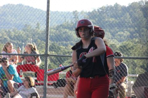 Rabun County’s Mary Lovell gets instructions from coach Angela Shepheard during an at-bat against Social Circle at Rabun County High School in Tiger last Thursday. (Glendon Poe/The Clayton Tribune)