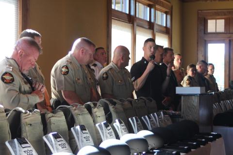 Chris Brown, vice president of SHIELD616, presents new protective gear to the Rabun County Sheriff's Office at The Waterfall Club on Aug. 29