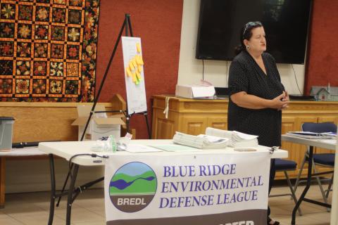 Megan Broome/The Clayton Tribune. Cherie Faircloth, founding member of the Rabun Gap Chapter of the Blue Ridge Environmental Defense League (BREDL), speaks at community discussion she organized addressing “What’s in your water?” at St. James Episcopal Church Sept. 25. The goal of the discussion was to spark community interest and action about concerns of chemicals in the drinking water supply and how they are tested for. 