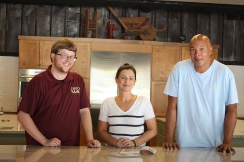 The Food Bank of Northeast Georgia organizes programs and provides resources to help people in need in Rabun County and the surrounding counties. Stephen MOntgomery-Anderson, operations manager, left, Sam Thacker, Teaching Kitchen manager, and James Brim, director of the Food Bank Mountain Branch, stand behind the counter in the Food Bank Teaching KItchen that provides cooking classes to people of all ages. 