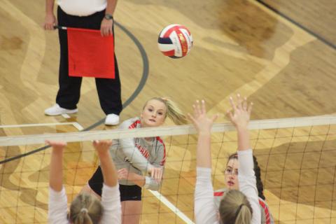 Rabun County’s Ali Ramey, top left, spikes the ball against Dade County during the quarterfinal round of the GHSA Class A/AA-Public state playoffs at Ken Byrd Court in Tiger last Saturday afternoon. (Glendon Poe/The Clayton Tribune)