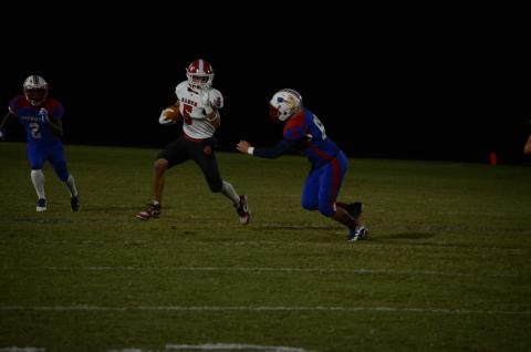 Wayne Knuckles/The Clayton Tribune. Sophomore wide receiver Hogan Woodward picks up yardage against Oglethorpe on a punt return last Friday night.