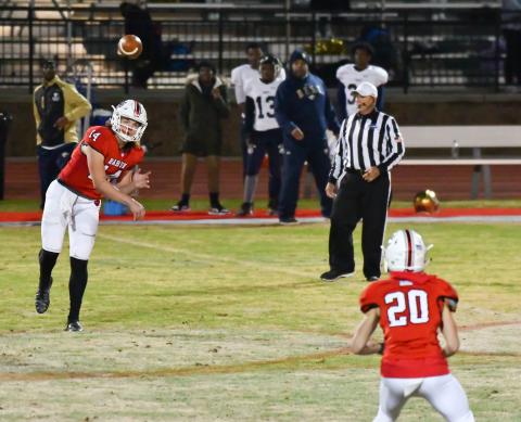 Gunner Stockton completes a pass to Sutton Jones against B.E.S.T. Academy Friday night.