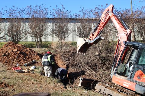 Megan Broome/The Clayton Tribune. A leak in the culvert at the intersection of the Food Bank of Northeast Georgia and Chechero Street last week caused contents to pour into Stekoa Creek. 
