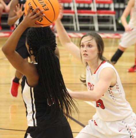 Andy Diffenderfer/The Clayton Tribune Laken Stiles defends during the Ladycats' rout of Social Circle. 