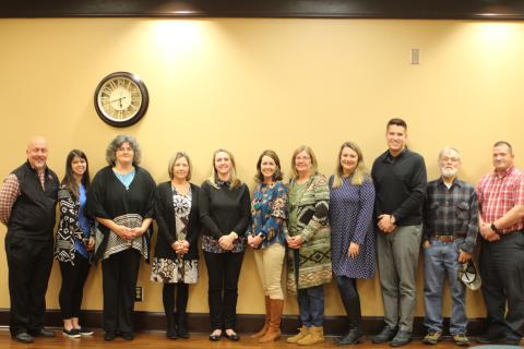 Megan Broome/The Clayton Tribune. Rabun County Schools recognized December Employees of the Month at their recent council meeting. Jay Fowler, RCPS Principal, from left, Jennifer Green, RCPS Employee of the Month, Laura Welborn, RCPS, Kelly Nixon, BOE Office, Jessica Cantrell, RCES, Stefanie Taylor, RCMS, Vicki Tyler, RCMS Principal, April Marshall, RCHS, Justin Spillers, RCHS principal, Jake Davis, Transportation Employee of the Month and Marty Dixon, Transportation Director. 