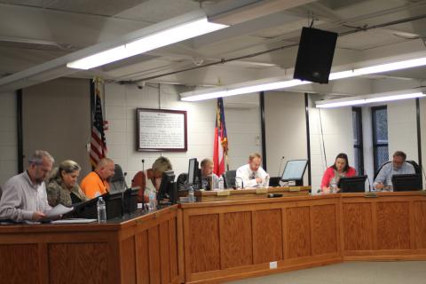 Megan Broome/The Clayton Tribune. The newly-elected Clayton City Council holds their first meeting of 2020 at the Clayton Municipal Complex on Tuesday. From left, Woody Blalock, Michelle Duquette, David Cross, Cissy Henry, city manager, Jordan Green, mayor, Mitch Baker, city attorney, Ara Joyce and John Bradshaw.