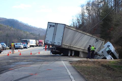 Megan Broome/The Clayton Tribune. A wreck involving a tractor trailer and two vehicles in Mountain City on Saturday afternoon resulted in injuries. 