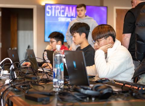E. Lane Gresham/Tallulah Falls School. Shown in the foreground is Tallulah Falls School junior Justin Yu of South Korea during the Jan. 21 Esports Elite Eight match versus Lambert High School. Also shown, front to back, are team members Daniel Shin of South Korea and Janson Zhou of the People's Republic of China, both freshman.