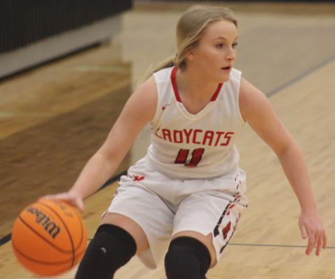 Andy Diffenderfer/The Clayton Tribune Ali Ramey tries to find an open teammate in Rabun County’s win over Putnam County. 