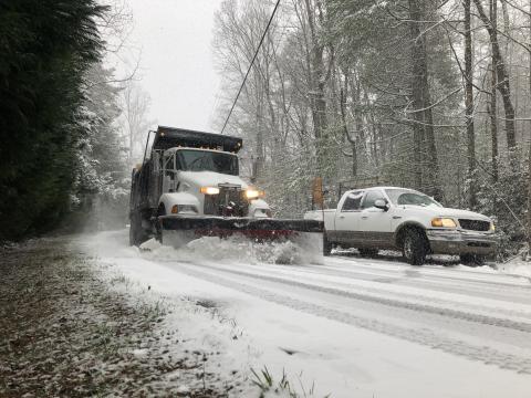 Daniela Cintron/For The Clayton Tribune Road crews were kept busy during Saturday’s snowstorm, which shut down traffic for a time.