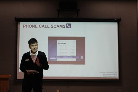 Yong Kim, executive vice president and CFO of Rabun County Bank, speaks to a group at a lunch and learn sponsored by Rabun County Bank about how to spot fraud and prevent being scammed on Tuesday, Jan. 28 at the Rabun County Library. 
