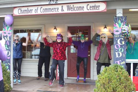 File photo Revelers take part in last year’s Mardi Gras event at the Welcome Center.