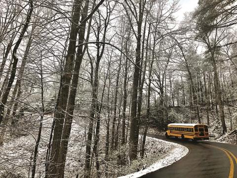 Daniela Cintron/The Clayton Tribune. A Rabun County school bus ferries students home following the early dismissal. 