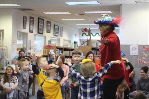 Megan Broome/The Clayton Tribune. Children sing and do the "Beanie Bag Dance" at the Rabun County Library on Wednesday, March 4 as part of activities celebrating Read Across America and the birthday of Dr. Seuss, which was celebrated March 2. 