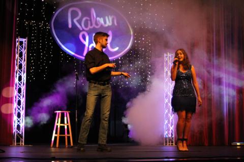 Megan Broome/The Clayton Tribune. Garrison Matlock, left, and Taylor Erlewine sing a duet of the song “Don’t Go Breaking My Heart” at the final Rabun Idol performance on Friday, Feb. 28 in the Fine Arts Building at Rabun County High School