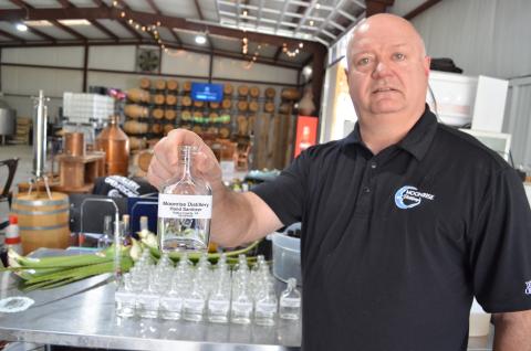 Wayne Knuckles/The Clayton Tribune. Moonrise Distillery in Clayton was one of the first craft distilleries in the nation to convert production to hand sanitizer during the COVID-19 health emergency. Owner Doug Nassaur said Moonrise will continue to make bottles of sanitizer available to local residents as long as it is possible to do so. 