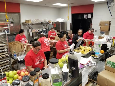 Photo courtesy Kristin Schupp Rabun County Primary, Elementary, and High School cafeteria staff come together to prepare 4,000 meals that fed 400 children for 5 days Monday. Director of School Nutrition Kristin Schupp said the Board of Education will continue this service as long as schools are closed for any child in our community. 