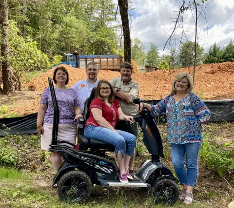 Submitted photo. Habitat requires "sweat equity" of each of their homeowners. Allison and Daniel's family have all joined in to help. From left to right: Kay Burrell, Daniel's mother, Daniel NIcholson, Jerry McFalls, Allison's father, Allison, and Allison's mother, Vicky McFalls. 