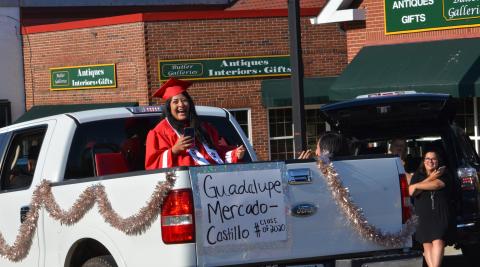 Wayne Knuckles/The Clayton Tribune. Members of the Class of 2020 were honored with a parade through Clayton Tuesday. Guadalupe Mercado-Castillo is all smiles as the crowd applauds. 