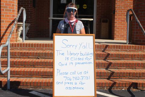 Megan Broome/The Clayton Tribune. Library Manager and "Chief Nerd" Caroline Frick
