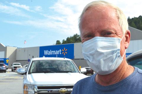 Wayne Knuckles/The Clayton Tribune. "I always wear a mask," said Keith Knudson as he prepared to shop at the Clayton Walmart Tuesday. 