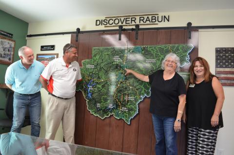 Wayne Knuckles/The Clayton Tribune. Rabun Chamber of Commerce President Juanita Shope has been hired by the county as a Business Development and Marketing Specialist. Meeting to discuss the appointment at the new Welcome Center on Highway 441 are, from left, Rick Story, executive director of the Development Authority of Rabun County, Claude Dillard, Development Authority board chairman and Dillard City Council member, Shope and Irene Bynum Faith, chairman of the Rabun County Chamber of Commerce. 