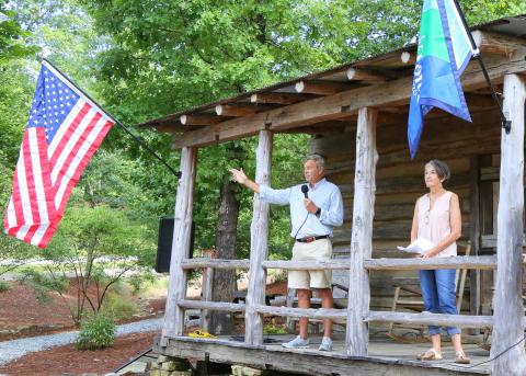 Photo courtesy Leif Erickson. Lake Burton Civic Association President Chip Groome and Linda Goen speak at Saturday's event. 