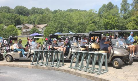 Andy Diffenderfer/The Clayton Tribune. The Sid Weber Memorial Cancer Fund annual golf tournament brought 18 teams Aug. 19 to Sky Valley Country Club.