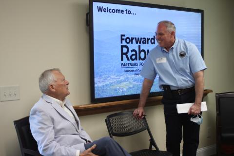 Megan Broome/The Clayton Tribune. Former Gov. Nathan Deal (left) is greeted by Forward Rabun Director Rick Story Tuesday at the organization's inaugural board meeting. Story previously worked for Deal during his time as Georgia governor. 