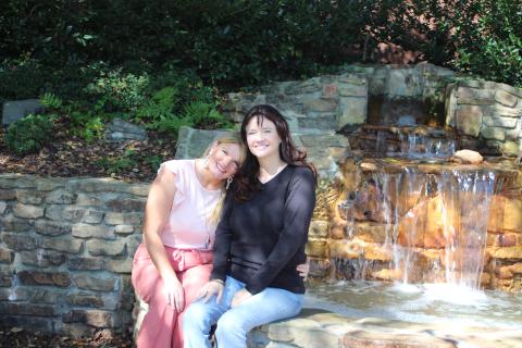 Megan Broome/The Clayton Tribune. Sisters Holly Cabe and Robin Billingsley are both breast cancer survivors and were both diagnosed at age 40. They advocate it's important to get yearly mammograms because they are the key for early detection.