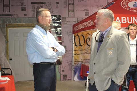 Megan Broome/The Clayton Tribune. Rep. Doug Collins talks with Sheriff Chad Nichols at a meet-and-greet held at the Rabun County Republican Party headquarters last Saturday. Collins is vying for a United States Senate seat and Nichols is running for reelection. 