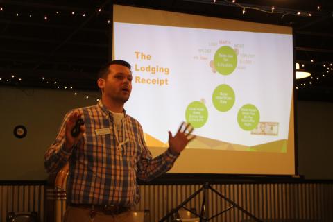 Megan Broome/The Clayton Tribune. Rabun officials received an overview of hotel-motel tax issues from Tyler Reinagel, director of planning and research for the Georgia Dept. of Community Affairs last week. 