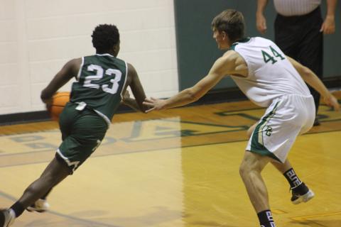 Andy Diffenderfer/The Clayton Tribune Devonte Allen of Tallulah Falls tries to drive on Rabun Gap’s Zsombor Vertes. 