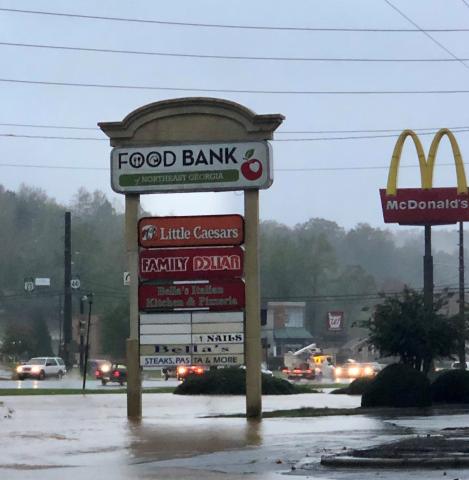 Wayne Knuckles/The Clayton Tribune. Stekoa Creek overflowed its banks in Clayton last Thursday as the remains of Hurricane Zeta knocked out power across the county for two days. 