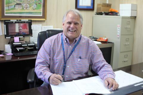 Megan Broome/The Clayton Tribune. Byron Youngblood is the supervisor of customer services at the Clayton Post Office and retires at the end of the year after 34 years of service to the United States Postal Service. 