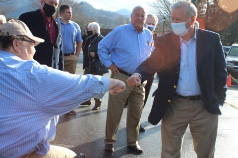 Megan Broome/The Clayton Tribune. Rabun County GOP Secretary Ed Henderson receives a fist bump from South Carolina Senator Lindsey Graham last week at a campaign rally held at The Dillard House. 