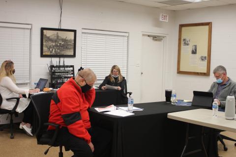 Megan Broome/The Clayton Tribune. Tallulah Falls City Clerk Linda Lapeyrouse, left, and Council Members Joey Fountain and Craig Weatherly receive the city’s fiscal year 2020 audit in a presentation from Joely Mixon of Mixon, Mixon, Brown and Tench CPAs at the Tallulah Falls town council meeting last Thursday. 