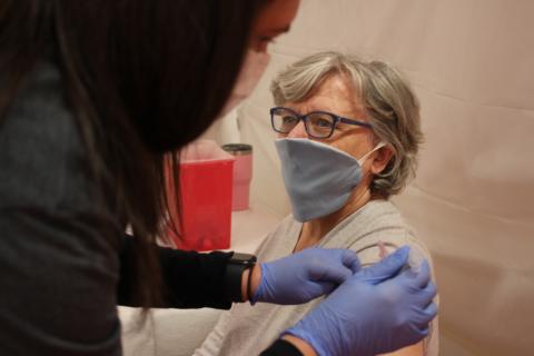 Megan Broome/The Clayton Tribune. Nurse Practitioner Natalie Hunter gives Rosa Gray a COVID-19 vaccine at the vaccination clinic held at the Rabun County Recreation Department on Tuesday. 
