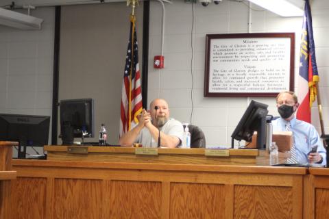 Megan Broome/The Clayton Tribune. Clayton Council Member David Cross, left, serves as Mayor Pro Tempore at Tuesday’s council meeting in Mayor Jordan Green’s absence. 