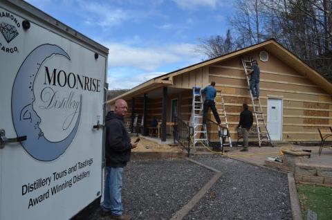 Wayne Knuckles/The Clayton Tribune. Doug Nassaur looks over expansion work currently underway at Moonrise Distillery in Clayton.