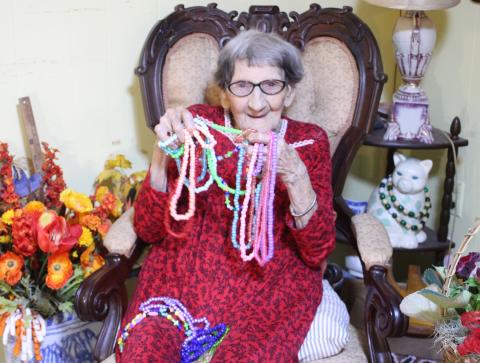 Megan Broome/The Clayton Tribune. Althalene Waters spends her days making necklaces and bracelets out of beads and finds pleasure in gifting them to everyone she meets. She was born on March 20, 1920 and turns 101 on Saturday. 