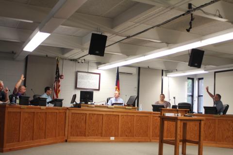 Megan Broome/The Clayton Tribune. Clayton council members vote to make a counter-offer to the county after a closed session following a special called meeting on Tuesday. 
