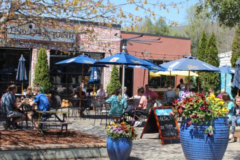 Megan Broome/The Clayton Tribune. Universal Joint in downtown Clayton was doing booming business on a beautiful spring day recently. 
