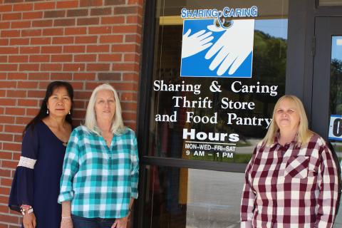 Megan Broome/The Clayton Tribune. Monthian Phillips, vice president of Rabun County Sharing and Caring, left, Gail Whitmire, food pantry manager and Linda Giles, president, are volunteers at Rabun County Sharing and Caring. The nonprofit recently moved locations to Plaza Way in Clayton after being located on Hiawassee St. since 1999.